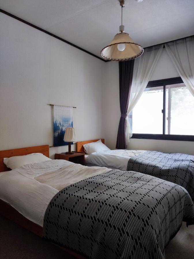 Guest House Zu-Thones Hakuba Buitenkant foto
